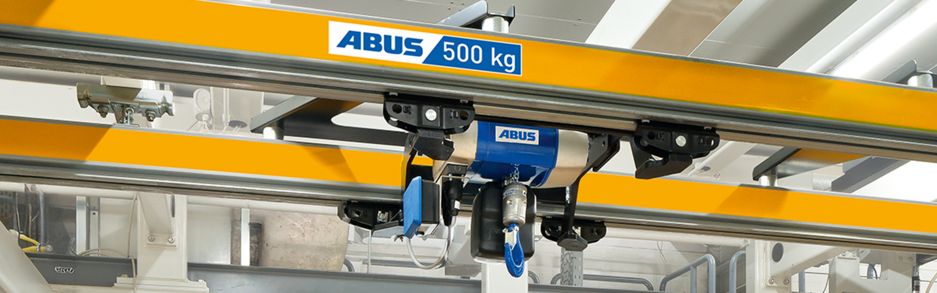 ABUS Einschienenbahn mit elektrischem Kettenzug für innerbetrieblichen Materialtransport.